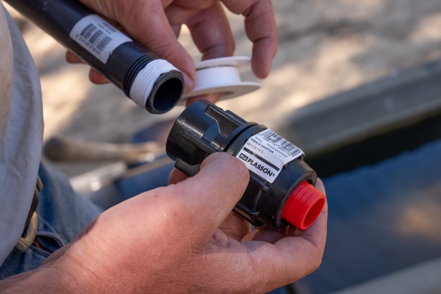 Fitting a PLASSON adaptor to polyethylene pipe in the field